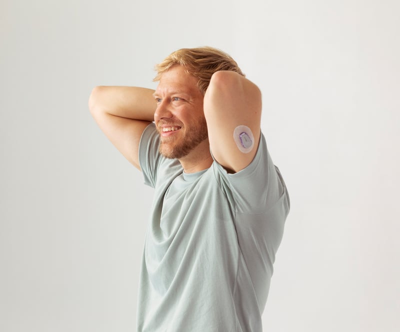 Man with Dexcom G6 on arm